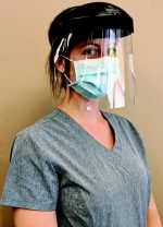 Front-line worker wearing hellberg face protection
